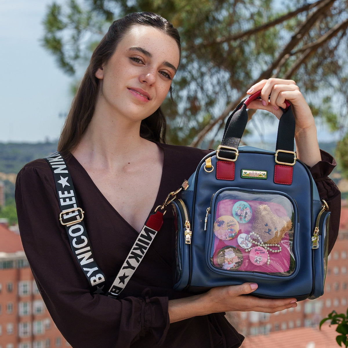 BANDOLERA CONVERTIBLE A MOCHILA (TEDDY & PIN)