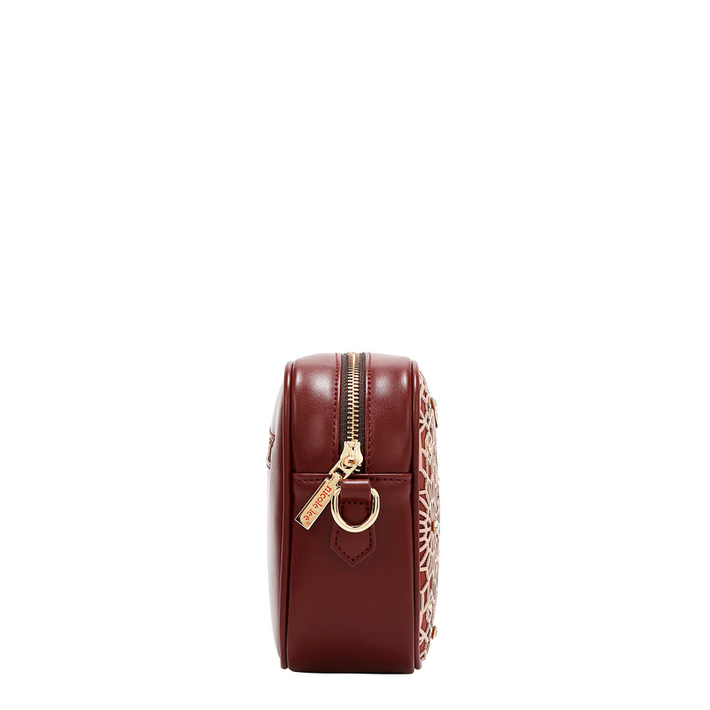 BOLSO BANDOLERA GEOMÉTRICO CORTADO A LÁSER (VINO)