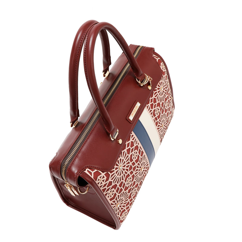 BOLSO BOSTON CON CORTE LÁSER GEOMÉTRICO (VINO)