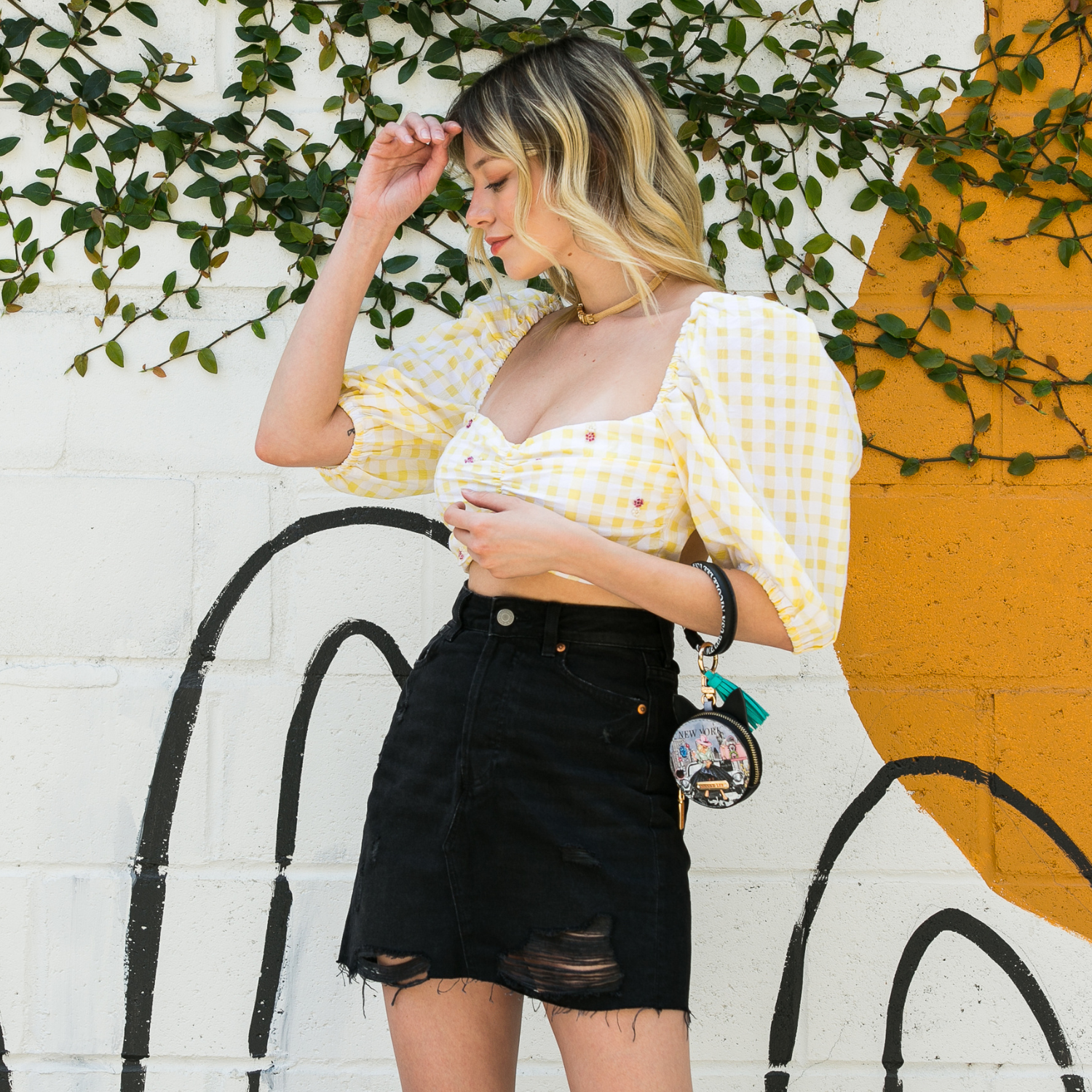 PULSERA CON LLAVERO Y MONEDERO